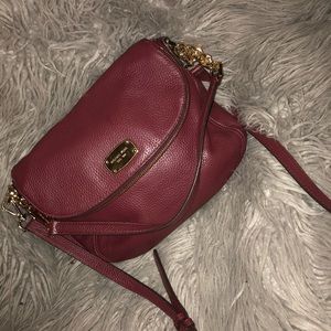 Maroon with gold accents Michael Kors Bag
